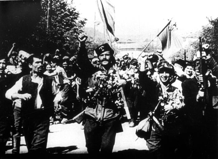 Communist partisans celebrate 9 September 1944. This famous propaganda photo turned out to have been doctored