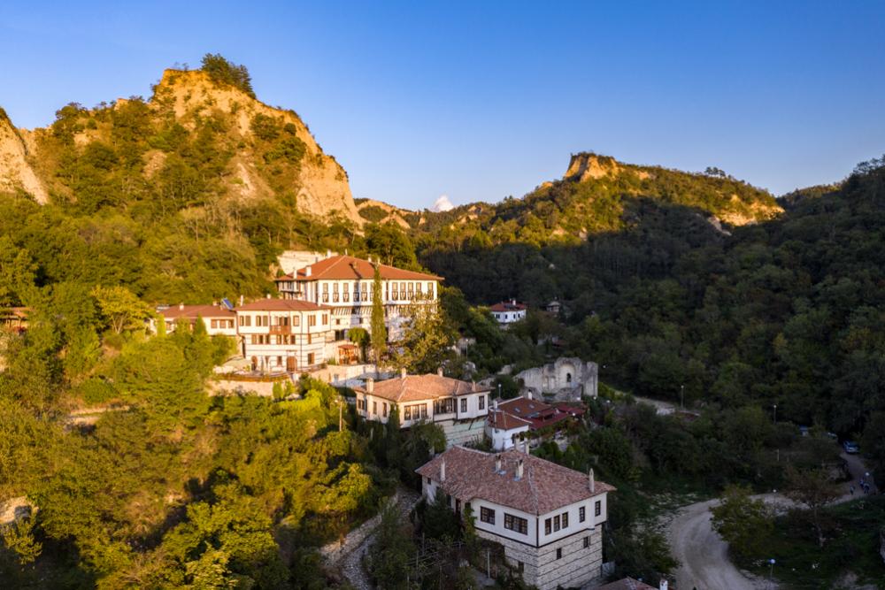 The mansion of the wealthy Kordopoulov family looms over the rest of Melnik, surrounded by the town's emblematic sandstone cliffs